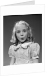 1940s 1950s blond girl whistling lips puckered eyes wide open looking at camera by Anonymous