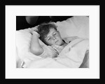 1940s 1950s boy sleeping in bed by Anonymous
