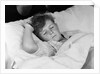 1940s 1950s boy sleeping in bed by Anonymous