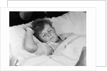 1940s 1950s boy sleeping in bed by Anonymous
