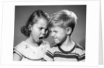 1950s boy and girl arguing head to head by Anonymous