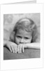 1930s portrait sad little blond girl peeking over her hands looking at camera by Anonymous