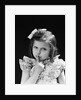 1950s child serious little girl pressing finger to lips hush be quiet secret by Anonymous