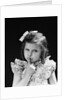 1950s child serious little girl pressing finger to lips hush be quiet secret by Anonymous