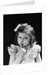 1950s child serious little girl pressing finger to lips hush be quiet secret by Anonymous