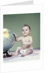 1960s smiling baby girl sitting in diapers hand touching world globe by Anonymous