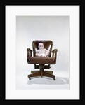 1960s chubby baby in diaper sitting in office executive chair by Anonymous