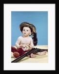 1960s baby boy wearing coonskin cap with stuffed animal and shotgun gun by Anonymous