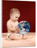 1960s symbolic ecology serious baby wearing cloth diapers sitting holding looking at the earth by Anonymous