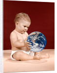 1960s symbolic ecology serious baby wearing cloth diapers sitting holding looking at the earth by Anonymous