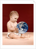 1960s symbolic ecology serious baby wearing cloth diapers sitting holding looking at the earth by Anonymous