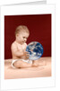 1960s symbolic ecology serious baby wearing cloth diapers sitting holding looking at the earth by Anonymous