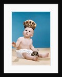 1960s baby wearing cloth diaper and crown holding a scepter by Anonymous