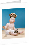 1960s baby wearing cloth diaper and crown holding a scepter by Anonymous