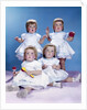 1950s 1960s quadruplet portrait 4 red haired girls wearing dresses two seated 2 standing by Anonymous