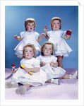1950s 1960s quadruplet portrait 4 red haired girls wearing dresses two seated 2 standing by Anonymous