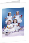 1950s 1960s quadruplet portrait 4 red haired girls wearing dresses two seated 2 standing by Anonymous