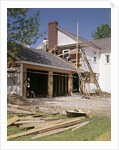 1960s 1970s workers building two car garage addition onto suburban home by Anonymous