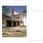1960s 1970s workers building two car garage addition onto suburban home by Anonymous
