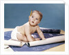 1960s baby architect sitting among blueprints by Anonymous