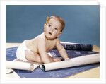 1960s baby architect sitting among blueprints by Anonymous
