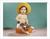 1960s baby wearing cowboy hat and holster with guns pistols looking at camera by Anonymous