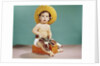 1960s baby wearing cowboy hat and holster with guns pistols looking at camera by Anonymous