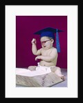 1960s graduate baby wearing mortarboard eyeglasses reading book by Anonymous