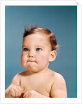 1960s baby portrait serious facial expression by Anonymous