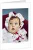 1960s baby wearing raincoat and hat by Anonymous