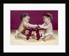 1960s two babies sitting at red stool playing cards poker with gambling chips by Anonymous