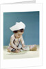 1960s baby wearing nurse nurse's cap stethoscope listening to doll heartbeat chest by Anonymous