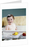 1960s smiling baby in bath looking at camera by Anonymous