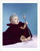 1960s baby dressed as royal queen in a velvet robe cloak cape rhinestone tiara crown and scepter wand by Anonymous