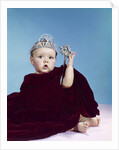 1960s baby dressed as royal queen in a velvet robe cloak cape rhinestone tiara crown and scepter wand by Anonymous