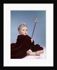 1960s baby girl wearing rhinestone tiara and red velvet cloak holding scepter by Anonymous