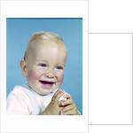 1950s 1960s happy laughing blond baby boy by Anonymous