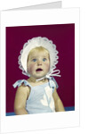 1960s blonde baby blue eyes wearing ruffled bonnet facial expression of wonder looking at camera by Anonymous
