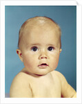 1960s portrait adorable sincere baby looking at camera by Anonymous