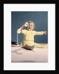 1960s baby holding telephone head set by Anonymous