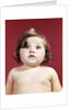 1960s portrait brunette baby girl with chubby round face uncertain facial expression looking at camera by Anonymous