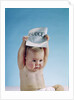 1960s baby holding budget sign above his head by Anonymous