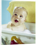 1960s happy baby taking bath by Anonymous