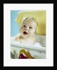 1960s happy baby taking bath by Anonymous