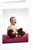 1960s crying baby wearing large boxing gloves by Anonymous