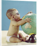 1960s baby wearing eyeglasses hugging the world globe earth by Anonymous