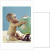1960s baby wearing eyeglasses hugging the world globe earth by Anonymous