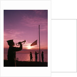1960s boy scout blowing bugle as others raise american flag at camp sunset ceremony by Anonymous