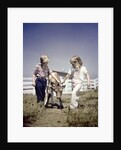 1940s 1950s boy girl leading young calf on farm by Anonymous