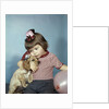 1950s 1960s little girl wearing party hat frowning hugging a cocker spaniel puppy by Anonymous
